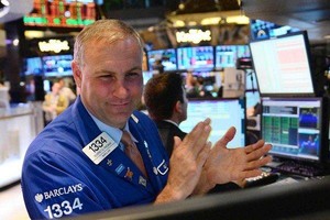 Niềm vui liên tiếp đến với giới đầu tư phố Wall (Ảnh minh họa: AFP)