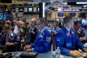 Phố Wall có phiên tăng mạnh thứ 2 liên tiếp nhờ thông tin từ FED - Ảnh: Reuters