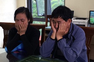 Vợ chồng Thanh - Tý khi bị bắt. Ảnh: Dân trí.