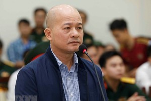 Đinh Ngọc Hệ tại phiên tòa trước. Ảnh TTXVN.