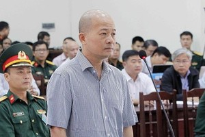 Đinh Ngọc Hệ tại phiên tòa trước.