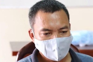 Ông Toàn khi bị bắt. Ảnh: Tuổi trẻ