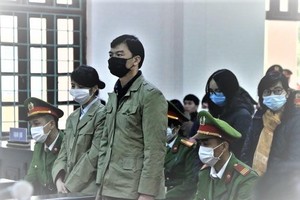 Các bị cáo tại phiên tòa hồi đầu năm 2021. 