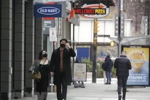 Ngân hàng Trung ương Canada phát tín hiệu rút dần kích thích tiền tệ