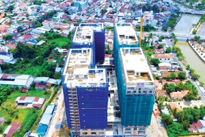 Gần 1 năm sau khi bán tài sản cho vợ Chủ tịch Trương Anh Tuấn, Địa ốc Hoàng Quân (HQC) mới công bố thông tin