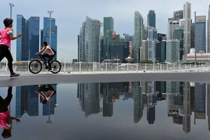 Thị trường chứng khoán Singapore đang thử giao dịch theo phong cách châu Âu để tự đổi mới