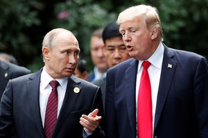 Tổng thống Nga Vladimir Putin và Tổng thống Mỹ Donald Trump. Ảnh: Reuters.