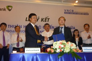 Vietcombank sẽ giúp tái cơ cấu Ngân hàng Xây dựng