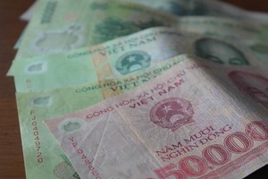 Phá hoại, hủy hoại tiền Việt Nam trái pháp luật sẽ bị phạt tiền