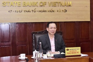 Phó Thống đốc Thường trực NHNN Đào Minh Tú.