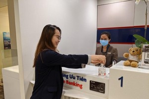 Năm 2021, tăng trưởng tín dụng có thể tăng 14,7%, mặt bằng lãi suất ổn định mức cuối năm 2020 