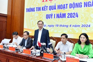 Ông Đào Minh Tú, Phó thống đốc thường trực Ngân hàng Nhà nước phát biểu tại Họp báo