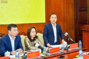 Ông Lê Hoàng Chính Quang, Cục trưởng Cục Công nghệ thông tin, Ngân hàng Nhà nước Việt Nam trả lời tại Họp báo