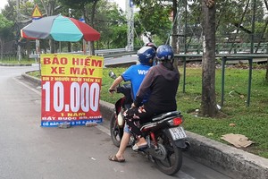 Bộ Tài chính nói gì về việc sản phẩm bảo hiểm bắt buộc xe máy bán đại hạ giá?