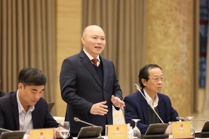 Ông Vũ Đăng Minh, Chánh Văn phòng, Người phát ngôn Bộ Nội vụ trả lời tại họp báo chiều 5/2 - Ảnh: VGP