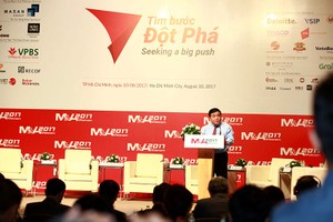 Bộ trưởng Bộ Kế hoạch và Đầu tư Nguyễn Chí Dũng phát biểu tại Diễn đàn - Ảnh: Lê Toàn