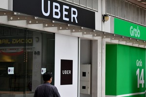 Hội đồng xử lý vụ việc cạnh tranh: Grab thâu tóm Uber không vi phạm Luật Cạnh tranh Việt Nam