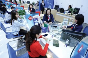 Cách nhìn của các ngân hàng với Mobile Money đã cởi mở hơn trước. Ảnh: Đức Thanh