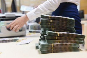 Dịch bệnh khiến nợ xấu của hệ thống ngân hàng lớn dần