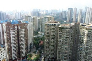 Ngân hàng đẩy mạnh cho vay mua nhà dẫn đến dư nợ lĩnh vực này tăng. Ảnh: Dũng Minh