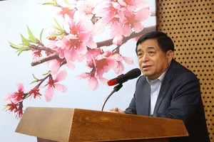 Bộ trưởng Nguyễn Chí Dũng phát biểu tại buổi gặp mặt chúc mừng năm mới, chúc thọ các cán bộ cao tuổi ngành Kế hoạch Đầu tư (Ảnh: Lê Toàn).