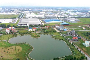 Giá đất tăng khiến việc đầu tư và mở rộng khu công nghiệp gặp nhiều khó khăn. Ảnh: Dũng Minh 