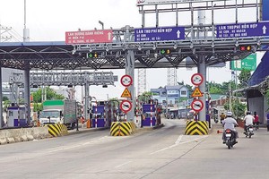 Trạm thu phí Dự án BOT mở rộng, nâng cấp Quốc lộ 14 qua tỉnh Đắk Lắk. Ảnh: A.M