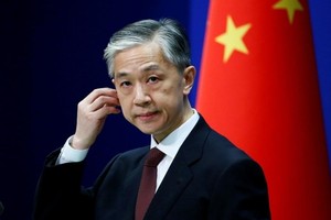 Người phát ngôn Bộ Ngoại giao Trung Quốc Uông Văn Bân. Ảnh: Reuters