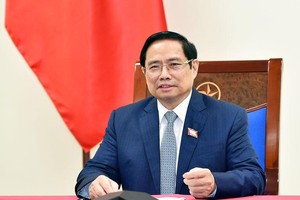 Thủ tướng Phạm Minh Chính điện đàm với Thủ tướng Hàn Quốc Kim Boo Kyum (Ảnh: BNG)