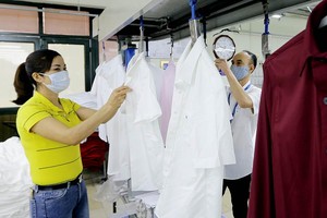 Dệt may Việt Nam có nhiều cơ hội để xuất khẩu sang Mỹ khi được giải tỏa lo ngại về hạn chế thương mại. Ảnh: Đ.T