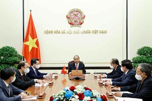 Chủ tịch nước Nguyễn Xuân Phúc điện đàm với Chủ tịch Cuba Miguel Díaz-Canel tối 23/8 (Ảnh: BNG)