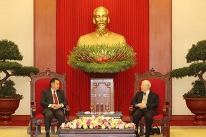 Tổng Bí thư Nguyễn Phú Trọng tiếp Chủ tịch Quốc hội Lào Xaysomphone Phomvihane (Ảnh: TTXVN)