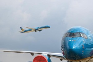 Việc mở lại các đường bay quốc tế sẽ thúc đẩy quá trình phục hồi kinh tế và gỡ khó cho các hãng hàng không. (Ảnh: Giang Huy).