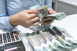 Tỷ lệ bao phủ nợ xấu cao chứng tỏ ngân hàng trích dự phòng nhiều hơn so với nợ xấu hiện hữu. Ảnh: Dũng Minh 