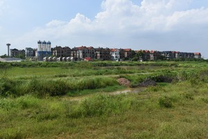 Cơ chế thu hồi, đền bù đất còn nhiều bất cập. Ảnh: Dũng Minh