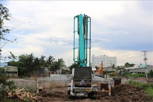 Nhiều công trình thi công cầm chừng do giá vật liệu xây dựng tăng cao. Ảnh minh họa: Tuấn Kiệt/TTXVN