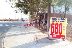 Thị trường bất động sản đang... “vào cua”. Ảnh: Việt Dũng