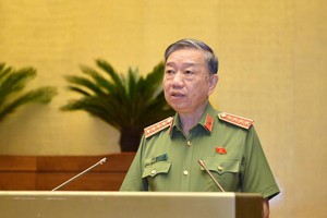 Bộ trưởng Bộ Công an Tô Lâm trả lời chất vấn đại biểu Quốc hội.