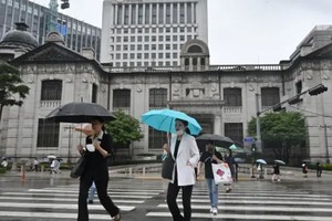 Ngân hàng Trung ương Hàn Quốc nhận định lạm phát sẽ giảm đáng kể trong tháng 3/2023 và tiếp tục giảm trong năm nay, nhưng vẫn trên mục tiêu trung hạn là 2%. Ảnh: AFP