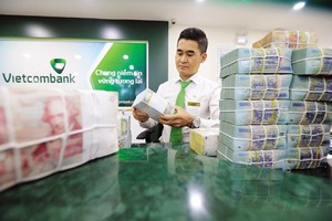 Chính sách tỷ giá luôn ảnh hưởng trực tiếp đến sự biến động của thị trường tài chính. Ảnh: Đ.T 