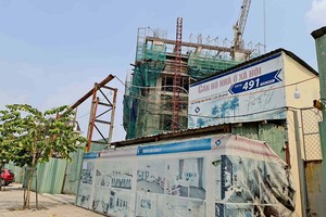 Việc doanh nghiệp xây dựng dự án nhà ở xã hội có thể vay vốn từ gói 120.000 tỷ đồng hay không phụ thuộc rất lớn vào tiến độ giải quyết pháp lý. Ảnh: Thiện Minh