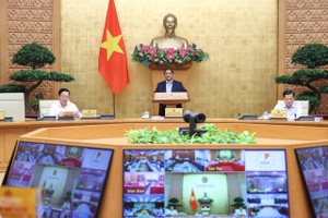 Thủ tướng Phạm Minh Chính chủ trì Hội nghị trực tuyến toàn quốc Chính phủ với các địa phương và phiên họp Chính phủ thường kỳ tháng 6/2023 - Ảnh: VGP/Nhật Bắc