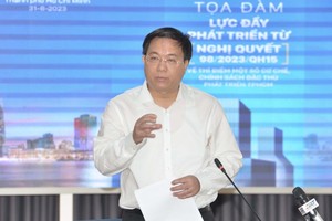 Thứ trưởng Bộ Kế hoạch và Đầu tư Trần Duy Đông phát biểu tại Tọa đàm.