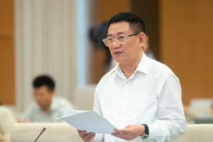 Bộ trưởng Hồ Đức Phớc trình bày Tờ trình dự thảo Nghị quyết của Quốc hội về việc áp dụng thuế thu nhập doanh nghiệp bổ sung theo quy định chống xói mòn cơ sở thuế toàn cầu