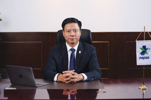 Ông Nguyễn Quang Minh, Tổng giám đốc Công ty cổ phần Thanh toán Quốc gia Việt Nam (NAPAS)