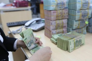 Nghị quyết nêu rõ, số thu ngân sách nhà nước năm 2024 là 1.700.988 tỷ đồng. Ảnh minh họa: BNEWS/TTXVN