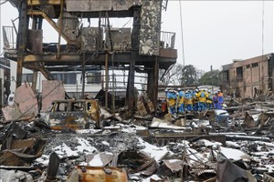 Lực lượng cứu hộ làm nhiệm vụ tại hiện trường động đất ở tỉnh Ishikawa, Nhật Bản ngày 9/1/2024. Ảnh: Kyodo/TTXVN