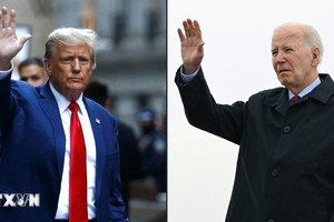 Tổng thống Mỹ Joe Biden (phải) và cựu Tổng thống Donald Trump. (Ảnh: AFP/TTXVN)