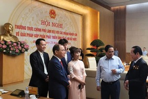 Thủ tướng Chính phủ Phạm Minh Chính và các lãnh đạo doanh nghiệp tại Hội nghị.