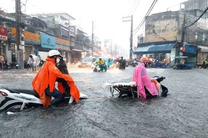 Khu vực chợ Thủ Đức thường xuyên bị ngập nặng mỗi khi trời mưa - Ảnh: Lê Minh